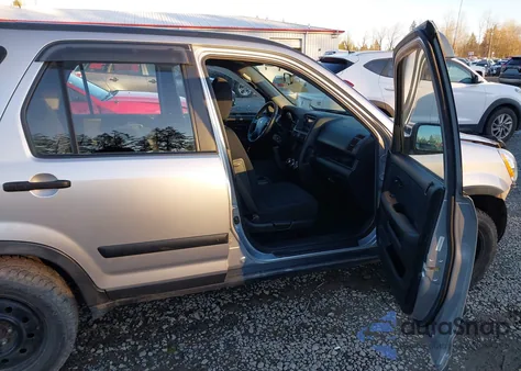 2006 Honda Cr-V Lx z USA, uszkodzony, nr VIN JHLRD78516C061422